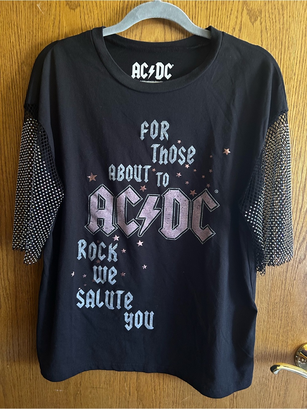AC/DC Tee with Logo/Studded Mesh Sleeves gently worn with flaws. Originally $40